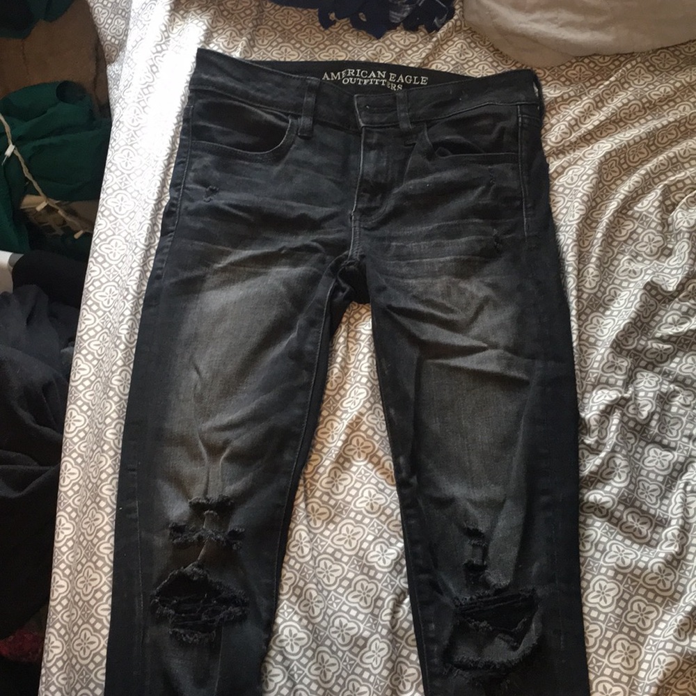 Black distressed skinny jeans
